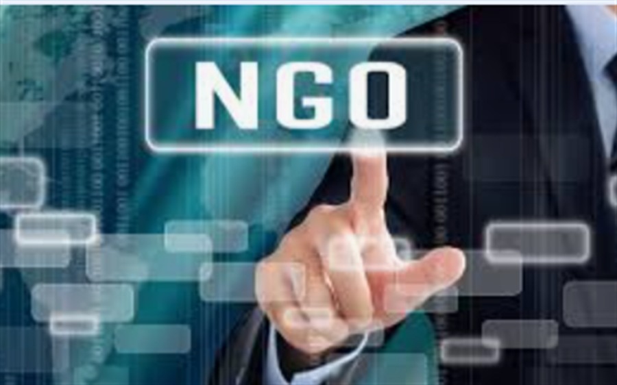 NGO Management concept with digital nonprofit workflows and mission program tracking.