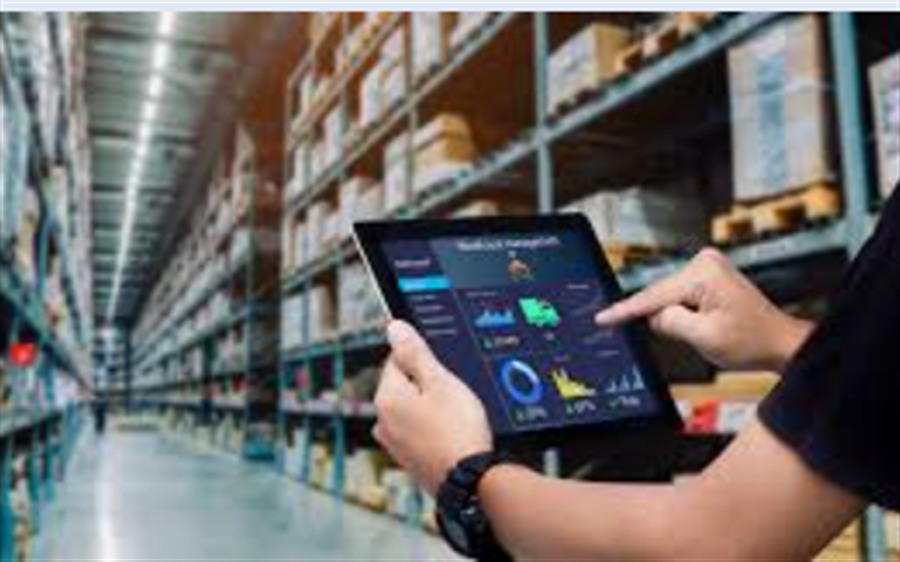 Warehouse Management visual with tablet-based inventory and warehouse operations tracking.